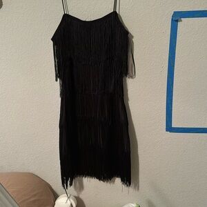 Size small black mini dress with tassels
